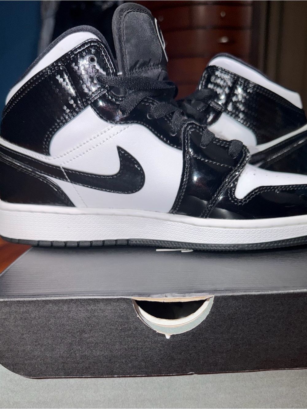Nike Men’s Black and White Mid-Top Sneakers